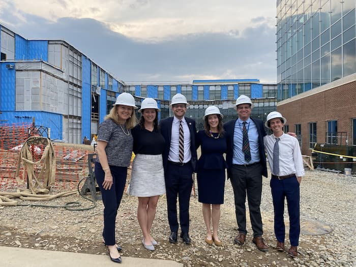 Secretary Guidera and Assistant Secretary Madi Biedermann Wearing Hard Hats at Waldron College